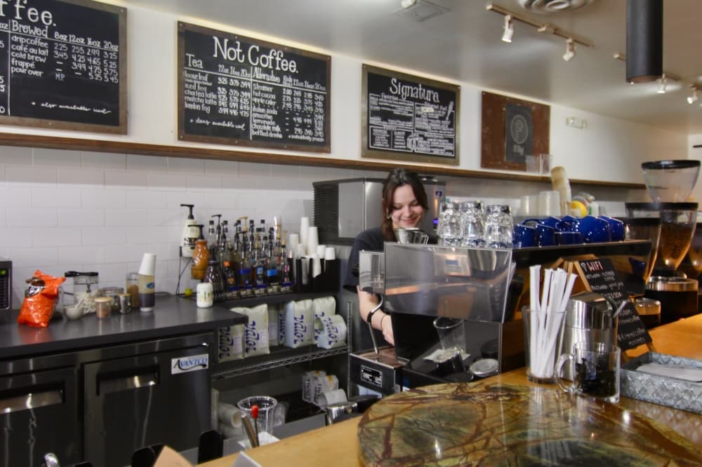Girl making coffee