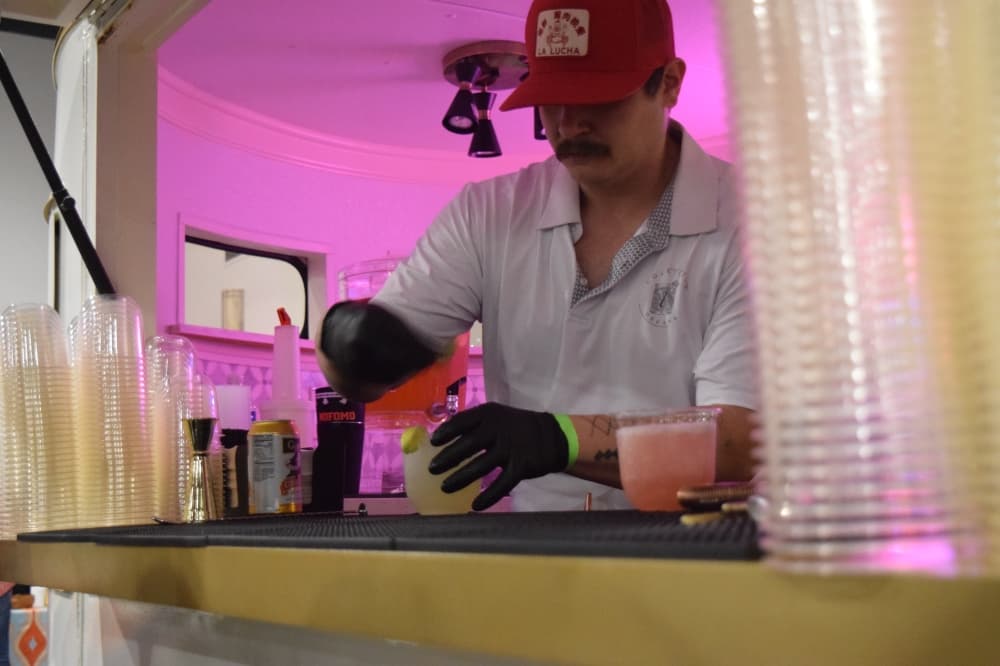 A man prepares drinks