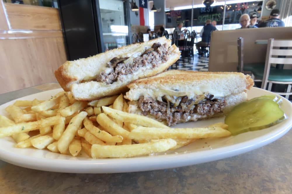 New menu items include the Patty Melt burger sporting two patties on Texas toast with Swiss cheese, onions and mushrooms. (Jonathan Perriello/ Community Impact)