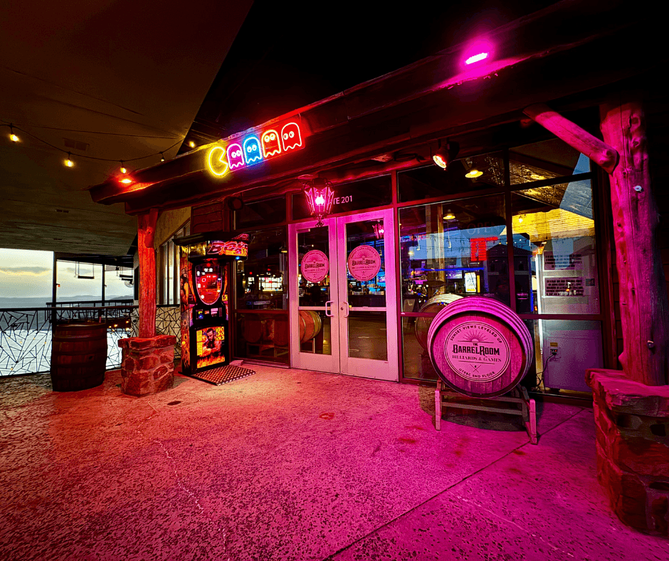 A view of The Barrel Room, the business' barcade which features shuffleboard, pool tables, and basketball games. (Courtesy Oasis Texas Brewing)