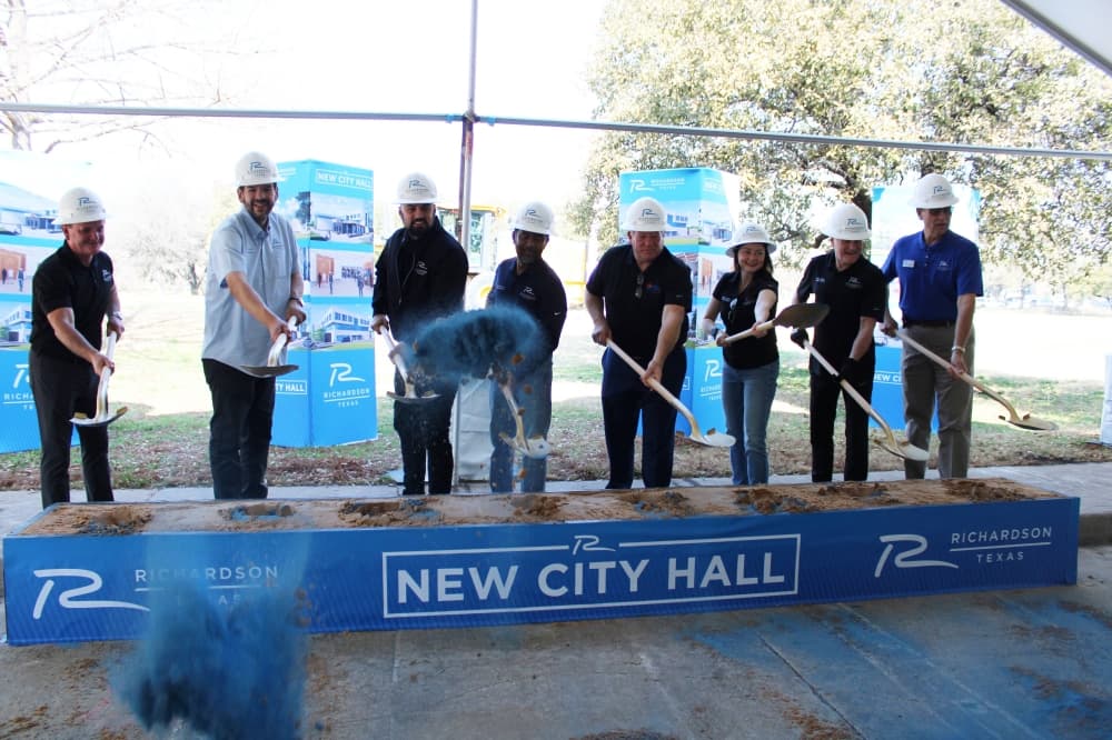 People breaking ground on a new construction project