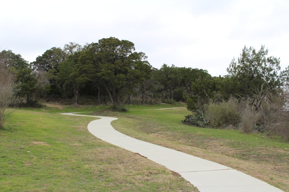 The project will feature an ADA-accessible path from Independence Drive to the top of the hill, along with several natural surface trails throughout the hilltop property. (Shaheryar Khan/Community Impact)
