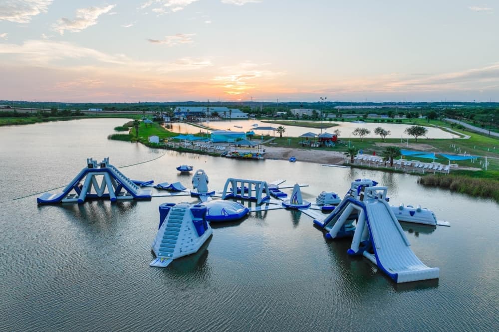 Aqua Park, which is slated to open in March, is a floating obstacle course featuring slides, trampolines, climbing walls and balance beams designed for all ages and skill levels. (Courtesy Texas Ski Ranch)