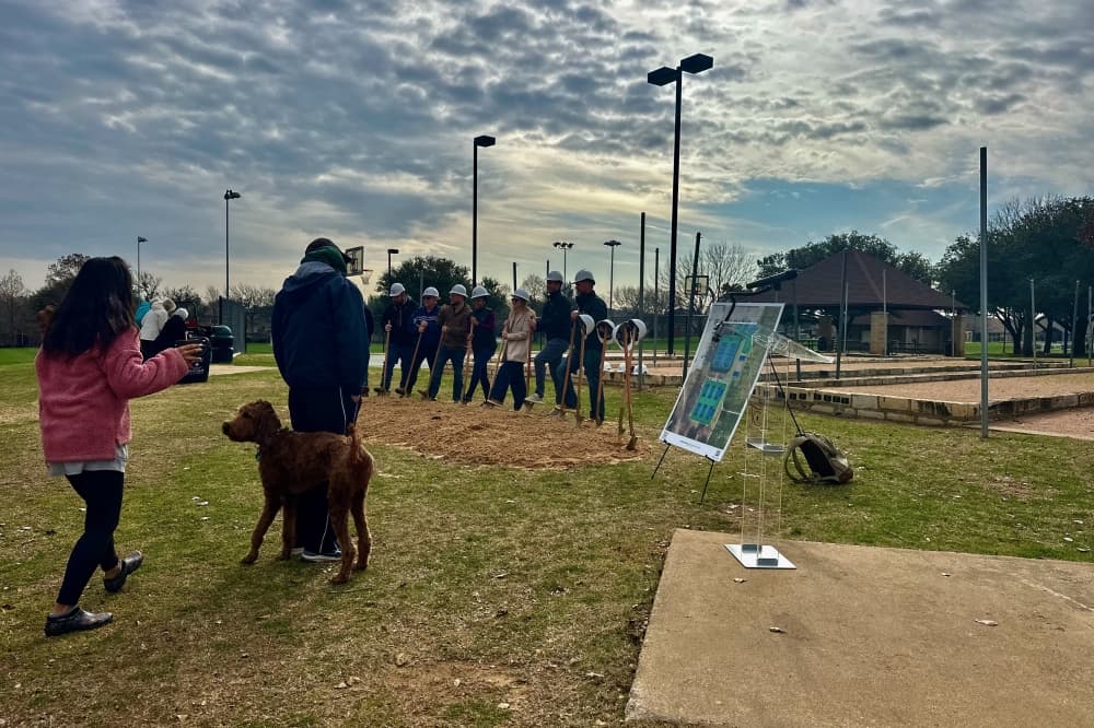 Residents looking at the pickleball court plans. 