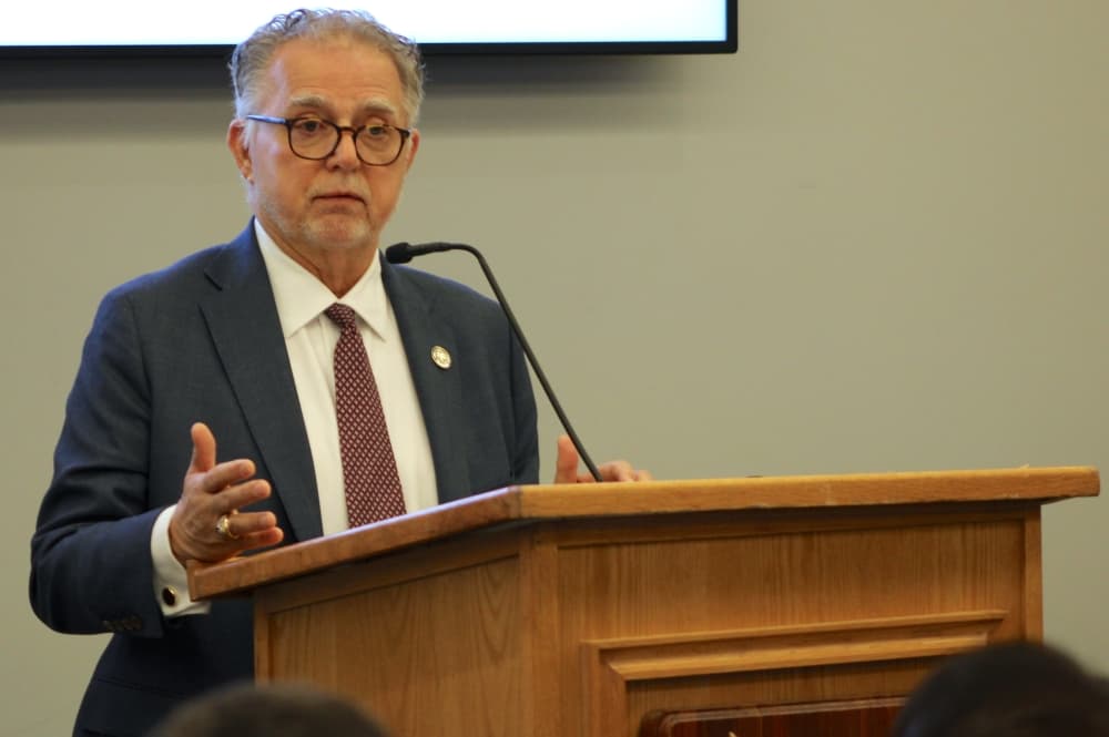 An engineering dean speaks at a podium. 
