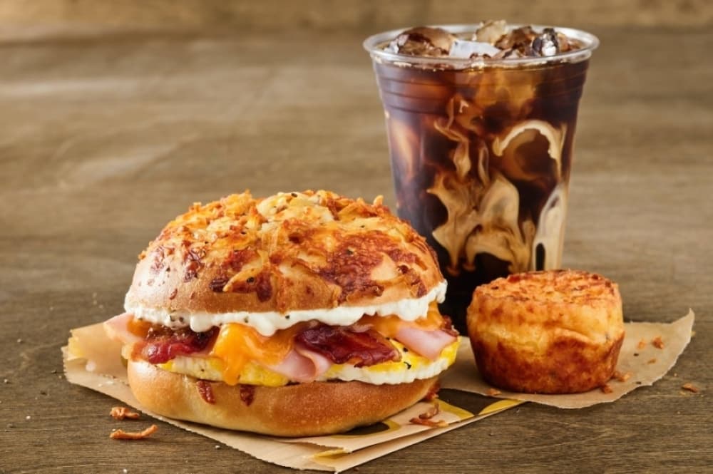 An image of an entree and drink available at the business. 
