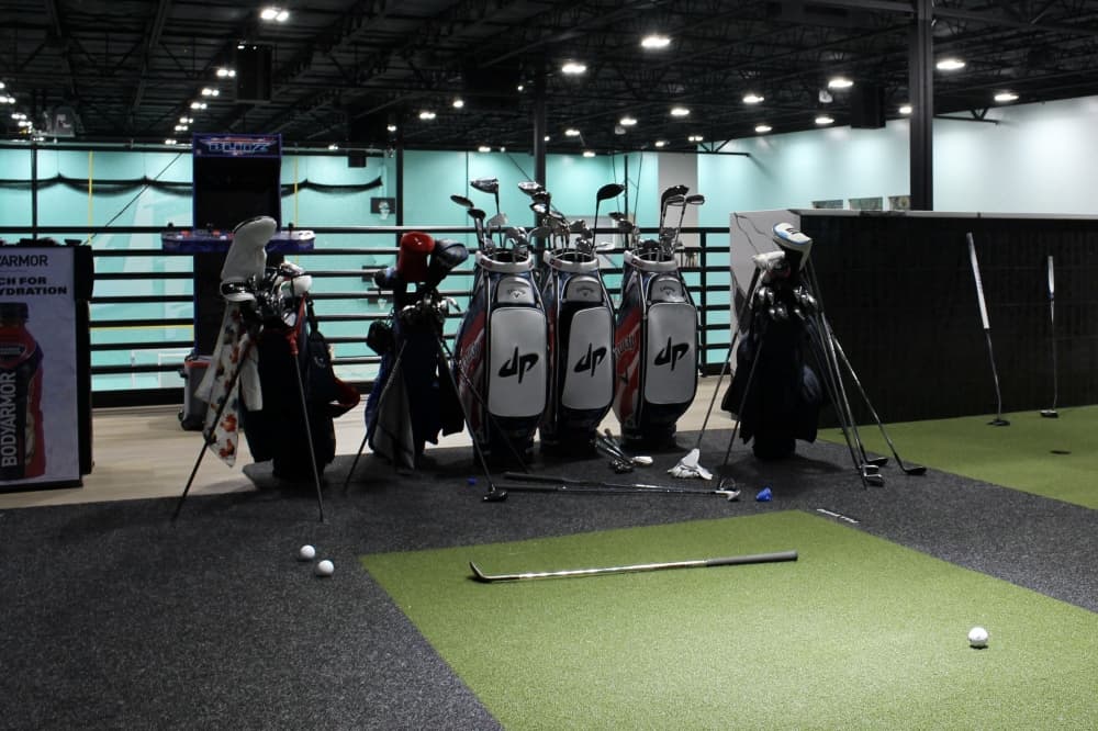 A second-floor loft in the new Dude Perfect headquarters features a golf simulator, gaming spaces and more. (Alex Reece/Community Impact) 