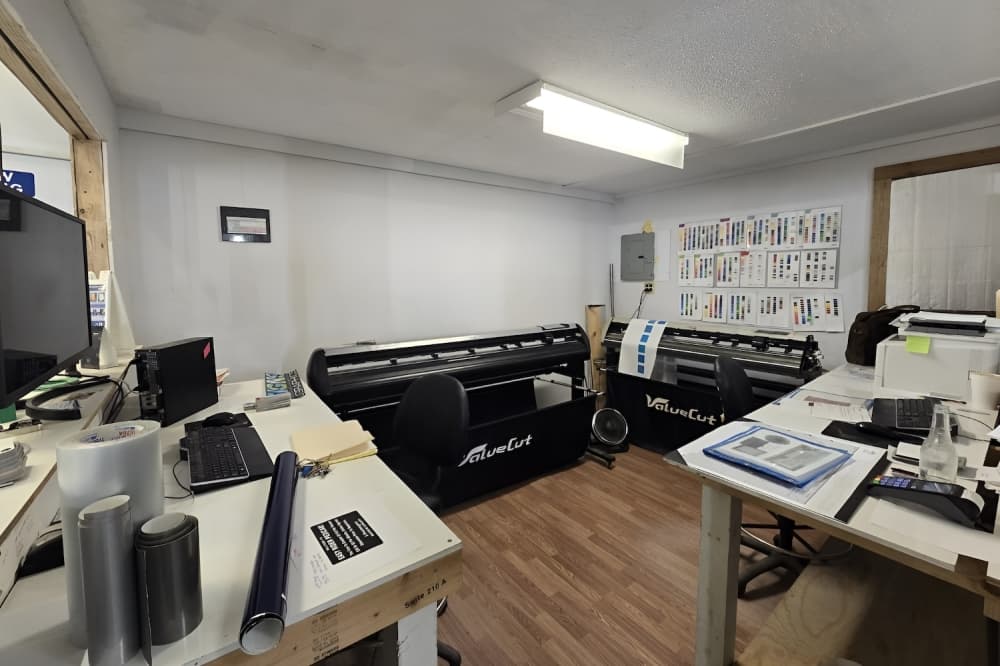 workspace with sign printers