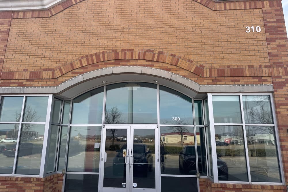 The physical building now stripped of the Coral Reef Coffee sign. 