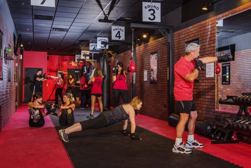 An image of people working out inside the gym. 