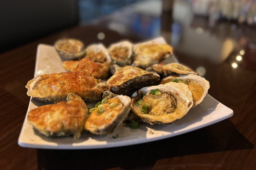 A photo of oysters on a plate