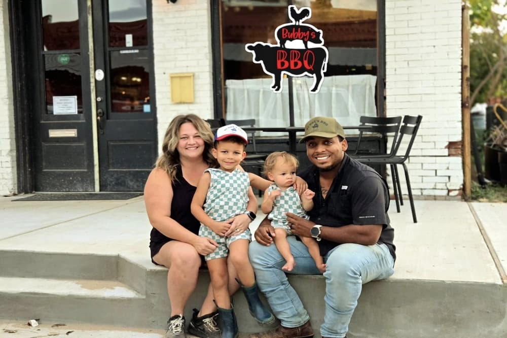 An image of the owners and their children. 
