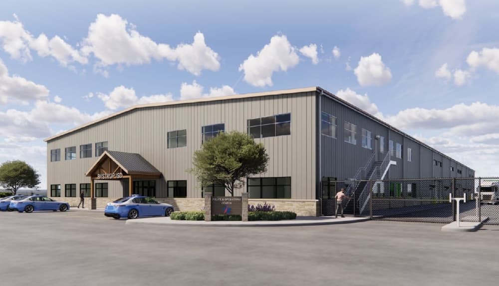 A rendering of the grey exterior is shown. The building is rectangular and two stories tall.