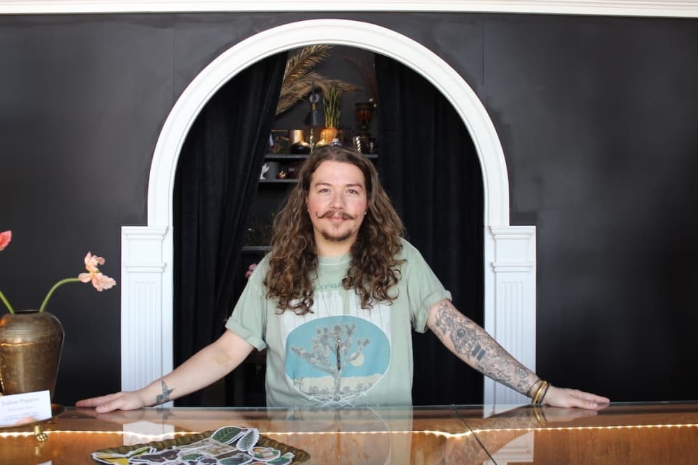 Saint Montogren's florist plants community roots in downtown Buda