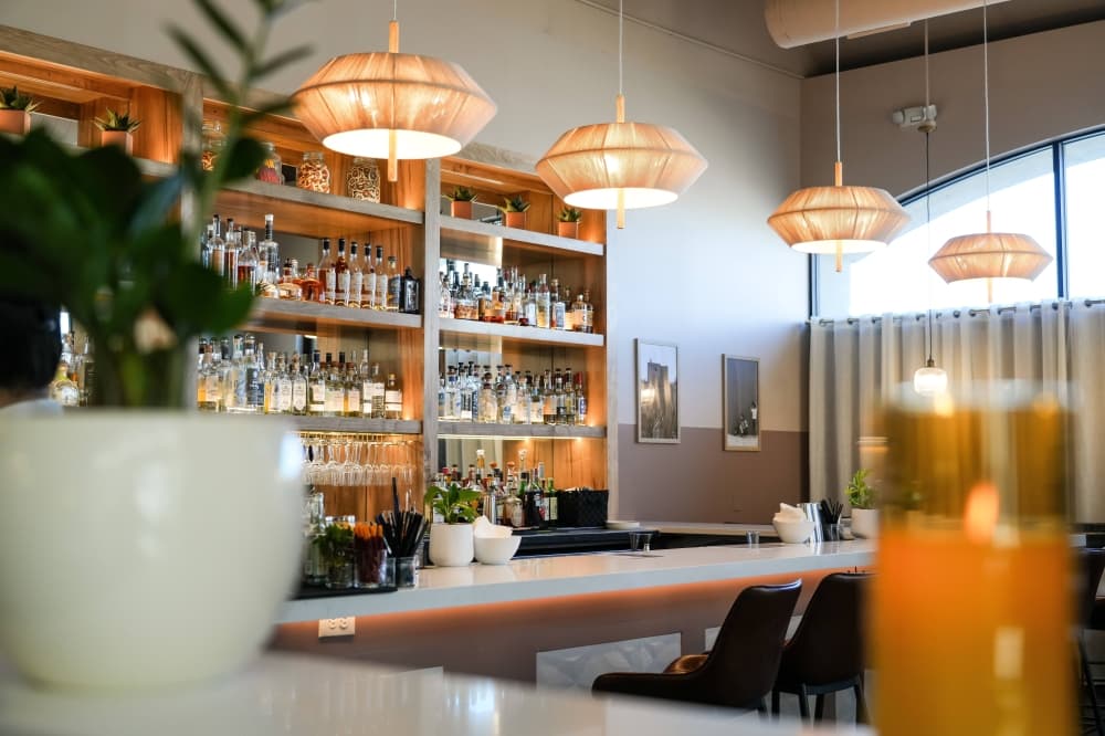 the interior of a modern Mexican restaurant