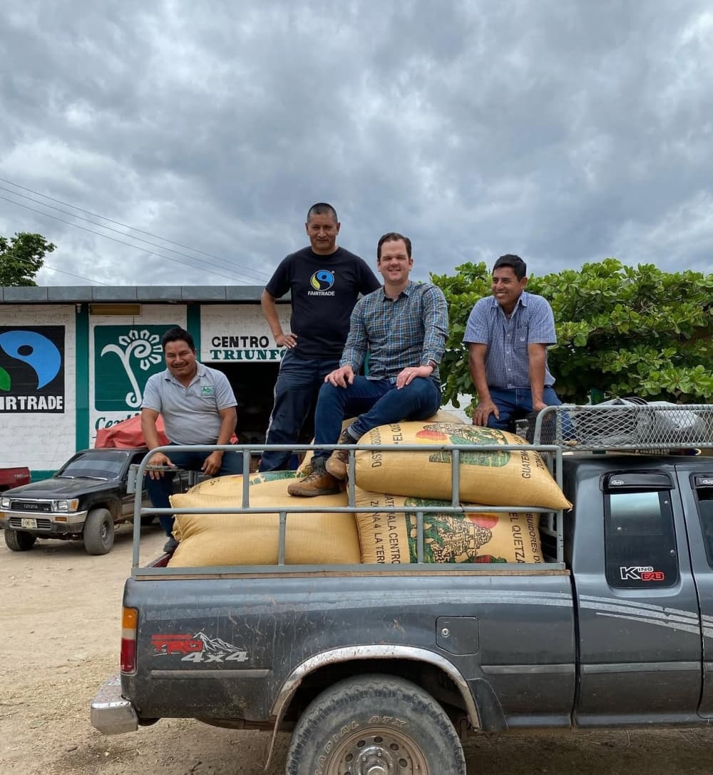 Wild Gift Coffee founder and owner in Mexico with coffee bean farmers 