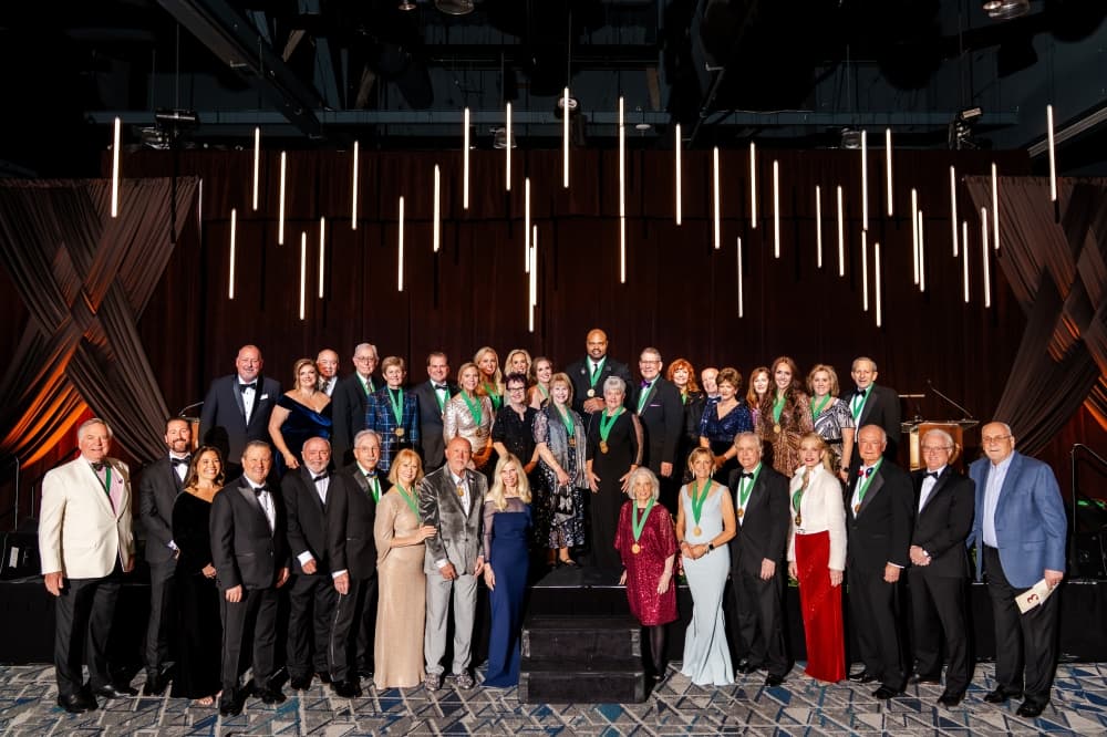 A large crowd gathers on stage
