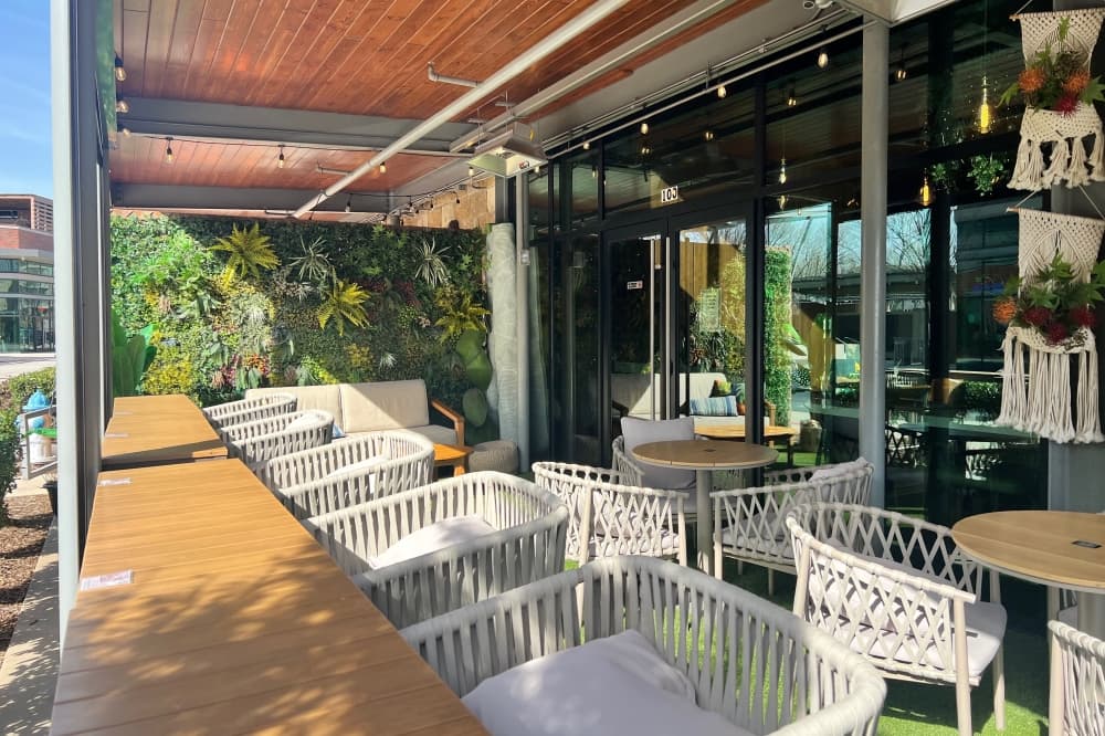 Escape 360 Cafe's patio pictured with seating and decorations