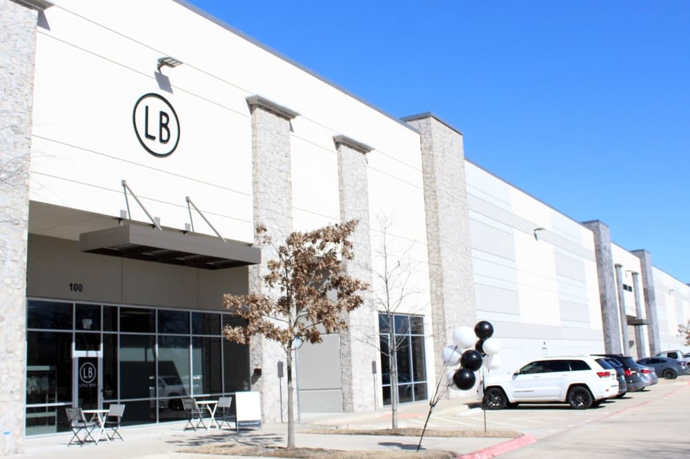 Exterior of a building with LB signage. 