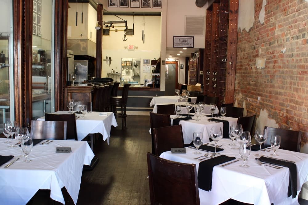 Six tables in a restaurant. 