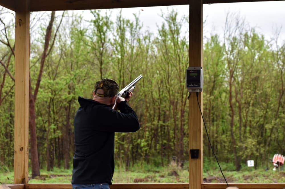 Man shooting at a target 