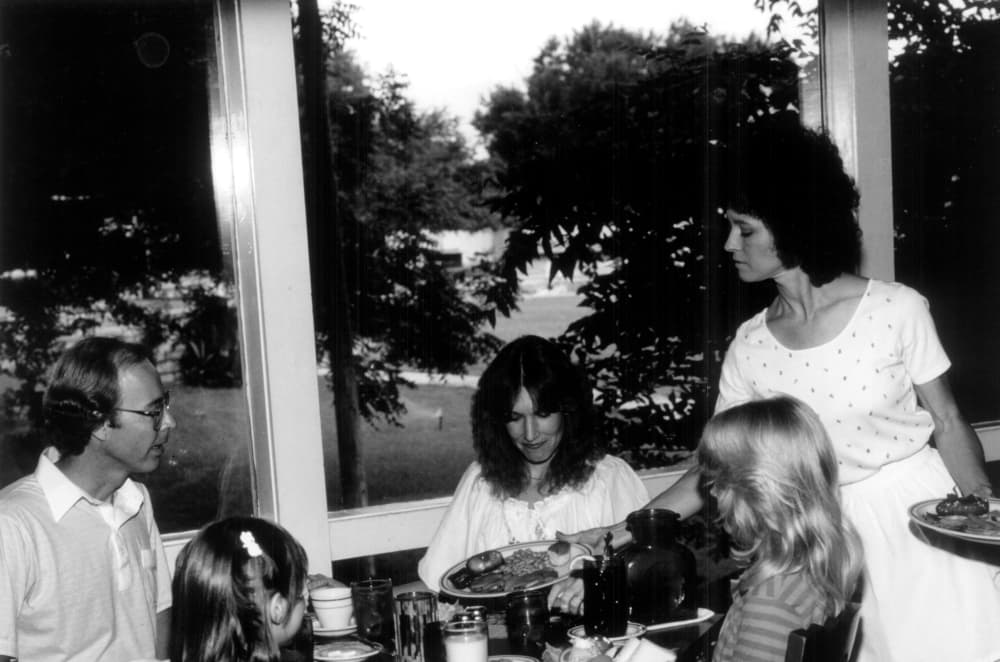 A waitress serves a family seated at the Stagecoach Inn & Restaurant in Salado. 