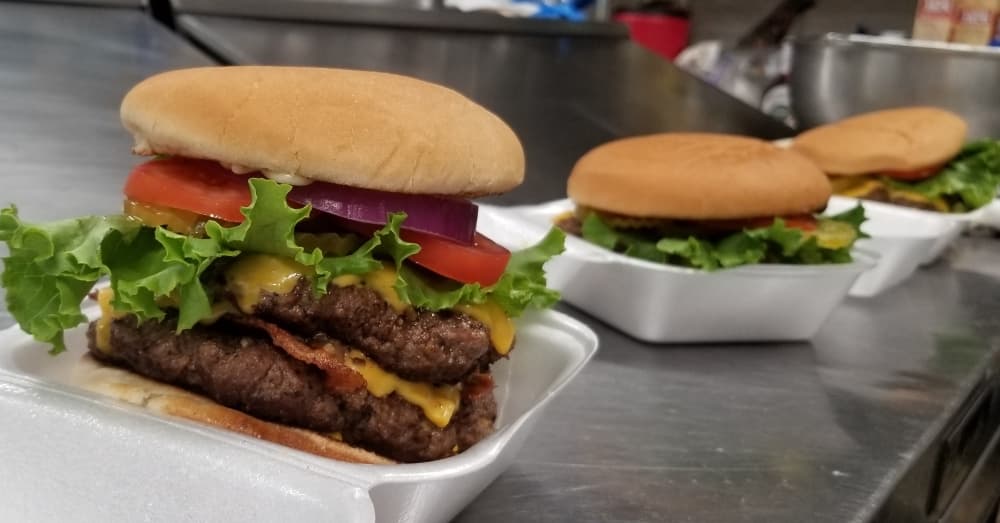 Busta’s Burgers expands to FM 1960, serves up food challenge