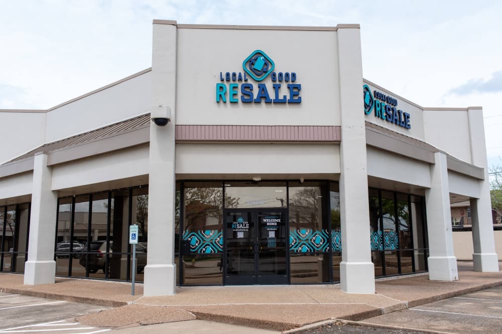 Exterior of building with Local Good Resale signage. 