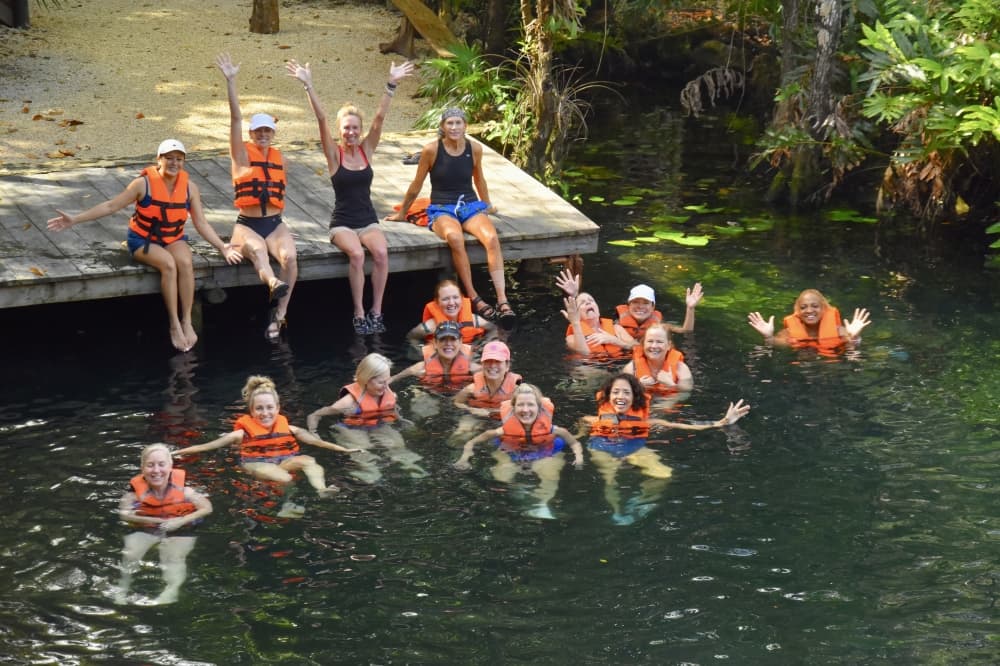 yoga members in lake in Tulum
