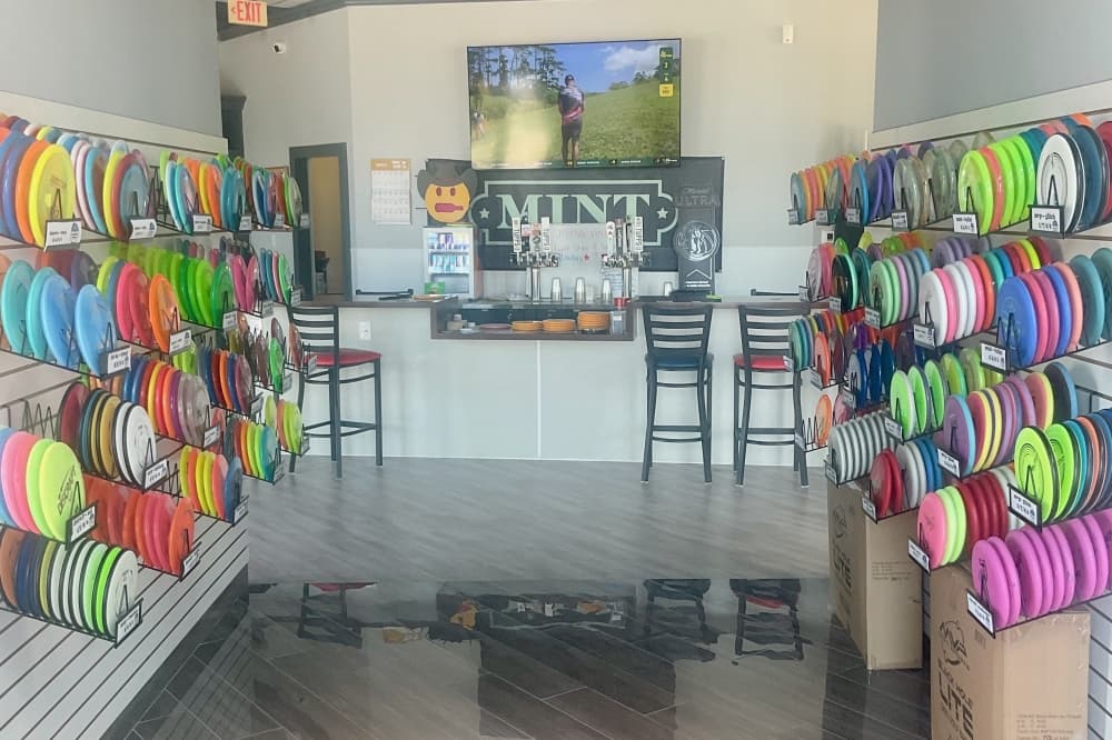 Discs on shelves and bar