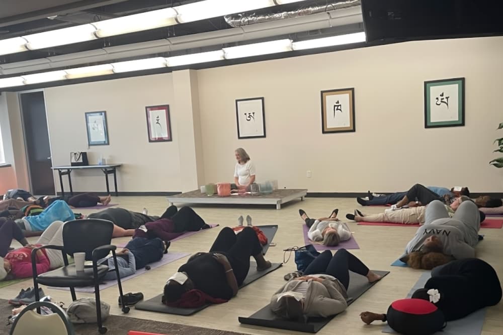 A photo of veterans in a sound healing session.