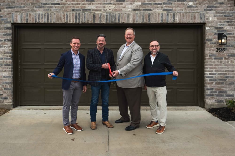 Group ribbon cutting photo
