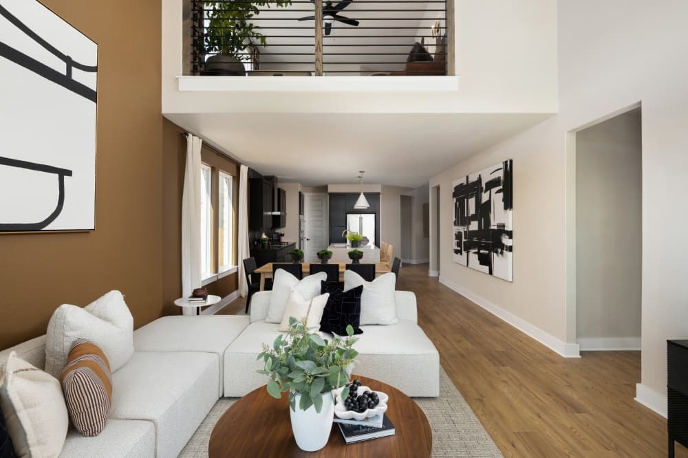 Modern living room furnished with MINE home furnishings in Flora 