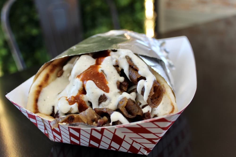 The lamb shawarma ($9.99) is made with pita bread and house sauce. (Jovanna Aguilar/Community Impact)
