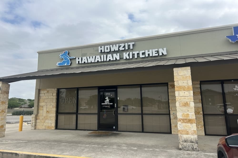 The outside of Howzit Hawaiian Kitchen in Schertz, Texas is shown.