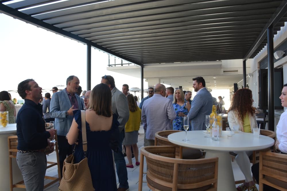 Guests gather on the sixth floor of Thirty-One Eleven Sunset to celebrate the grand opening of the luxury apartment complex.