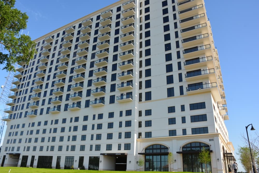 The 16-story Thirty-One Eleven Sunset began welcoming residents in early March. The luxury apartment complex has 207 residential units. 