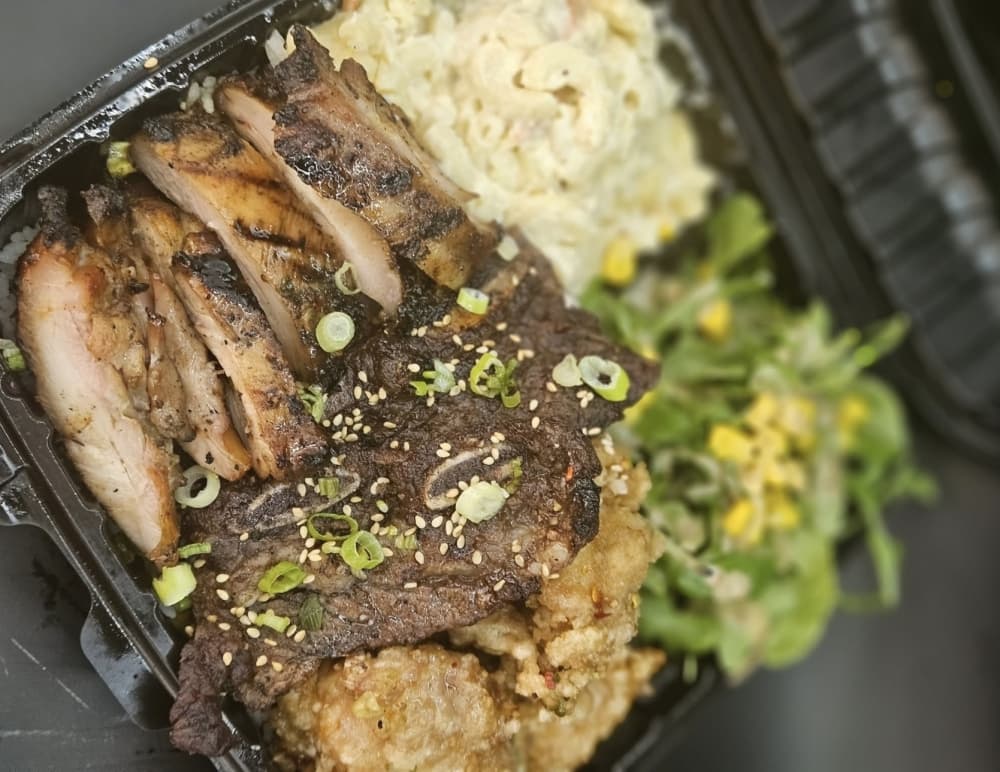 Howzit Hawaiian Kitchen's Beach BBQ Chicken Plate ($15) is made of boneless dark meat chicken marinated for 48 hours and grilled on a char-broil grill. (Courtesy Howzit Hawaiian Kitchen)