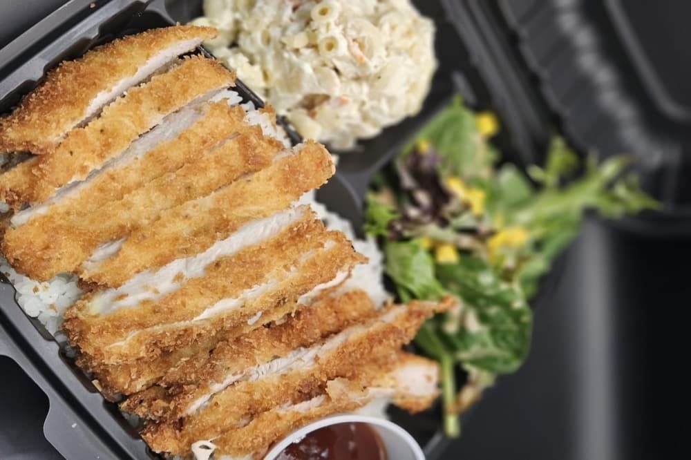 Howzit Hawaiian Kitchen's Chicken Katsu ($15) is a Japanese Chicken Cutler battered in Panko Bread Crumbs and served with a Katsu Sauce. (Courtesy Howzit Hawaiian Kitchen)