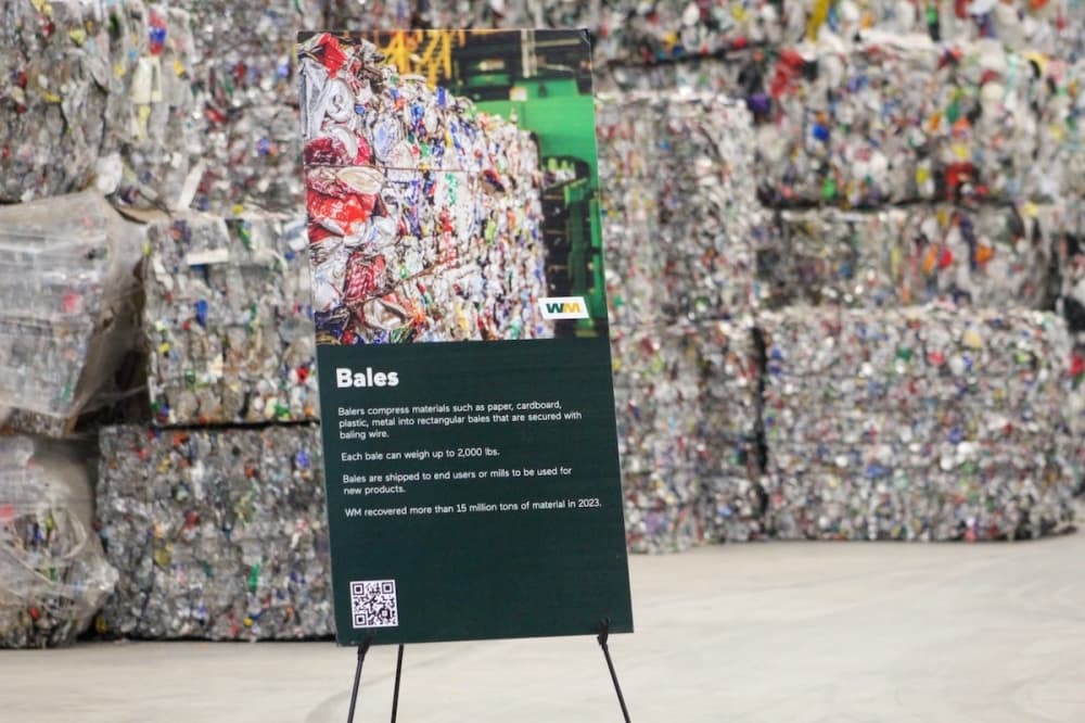 Balers compress materials like paper, cardboard, plastic and metal into rectangular bales that are secured with bailing wire. Each bale—which can weigh up to 2,000 pounds will be shipped to end users or mills to be used again. (Amira Van Leeuwen/Community Impact)