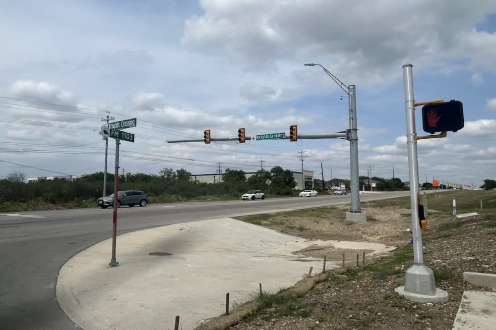 A picture of the street Knights Crossing in Cibolo, Texas is shown.