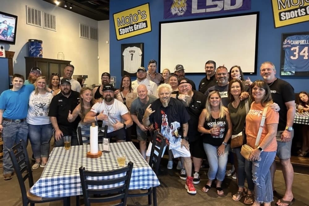 Members of the Humble Whiskey Club meet at Mojo's Sports Grille in Humble for a group outing. (Courtesy Humble Whiskey Club)
