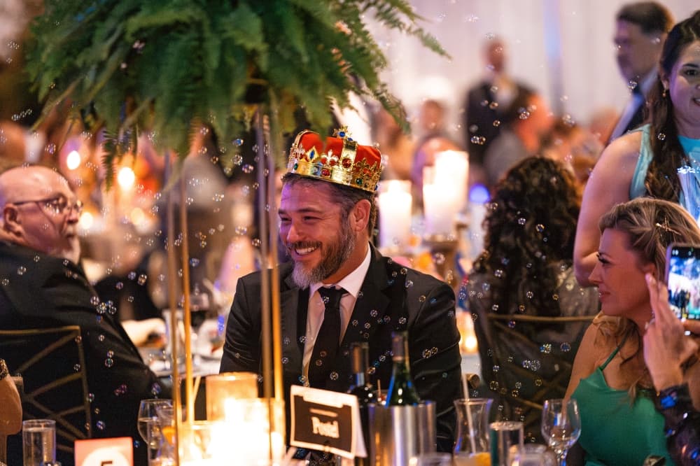 people celebrate at a gala