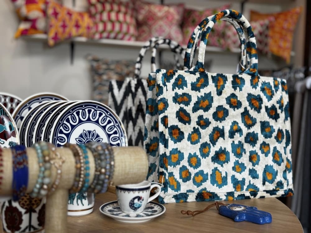 Table of bags and other decor for sale