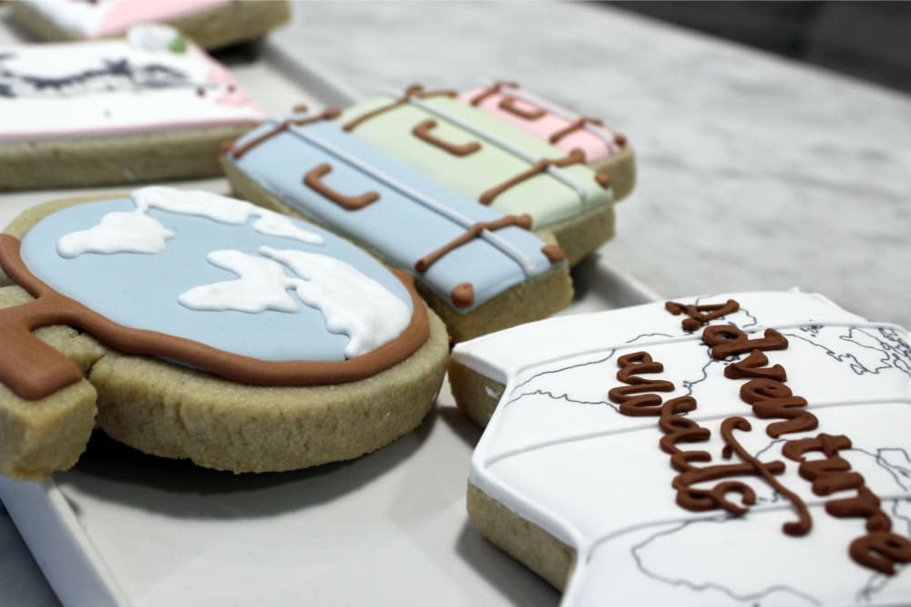 Sugar cookies topped with bridal themed icing. 