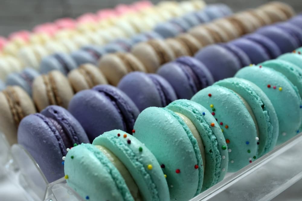 Rows of macarons in various colors. 