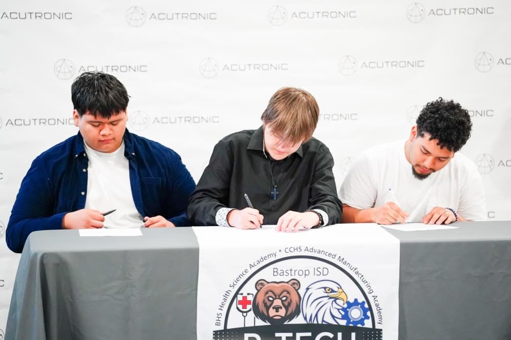 Bastrop ISD honors first cohort of P-TECH students signing with Acutronic Apprenticeship Alliance