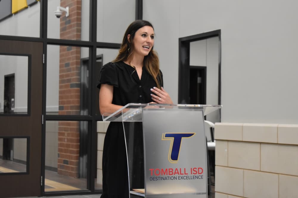 West Intermediate School Principal Caitlin Cain gives a speech at the ribbon-cutting ceremony for TISD's new intermediate school on May 2. (Community Impact/Julianna Washburn)