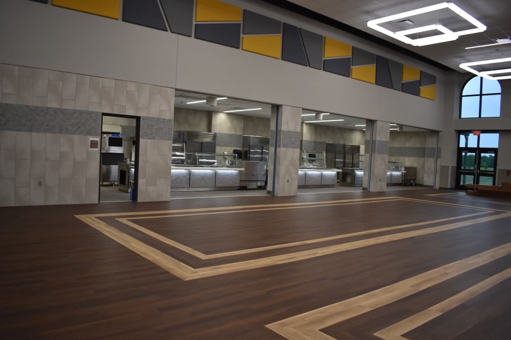 The cafeteria at the new West Intermediate School will feature dark wood flooring. (Community Impact/Julianna Washburn)