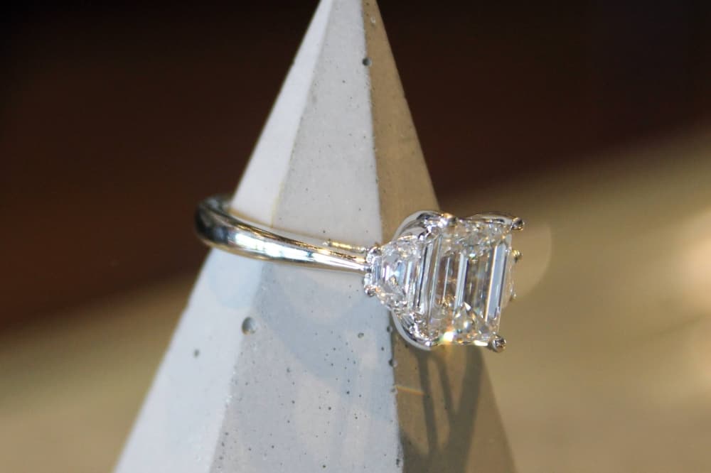 Solitary diamond ring on a display structure. 
